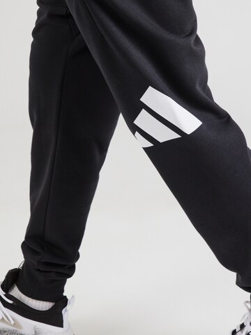 ADIDAS SPORTSWEAR Tapered Sports trousers in Black