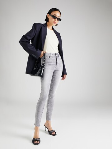 Skinny Jean 'WAUW' ONLY en gris