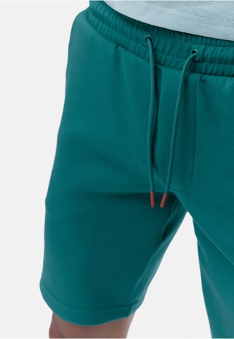 Born Living Yoga Regular Sports trousers 'Halong' in Green