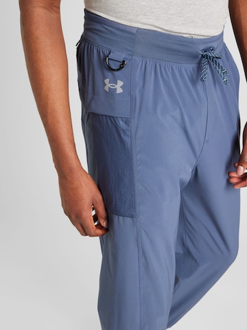 Tapered Pantaloni sport 'Run Trail' de la UNDER ARMOUR pe albastru