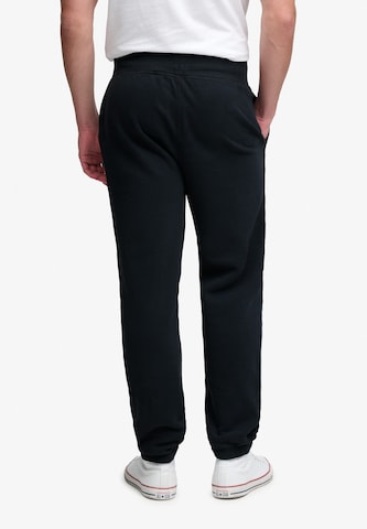 Superdry & Co Zúžený Kalhoty 'ESSENTIAL' – modrá