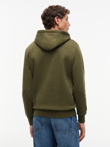 Bluză de molton de la TOMMY HILFIGER pe verde