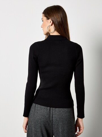 Cardigan Apricot en noir