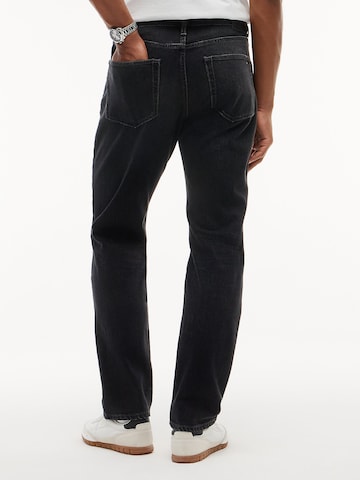 Coupe slim Jean 'Ryan' Tommy Jeans en noir