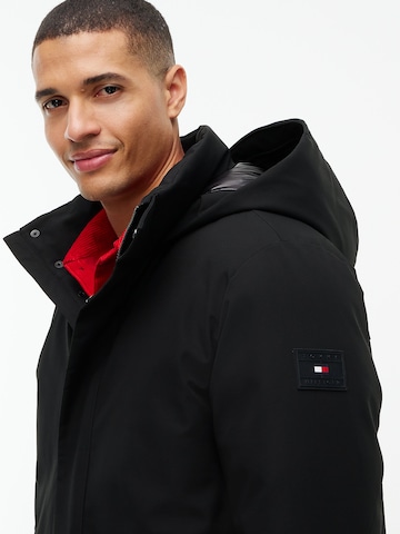 TOMMY HILFIGER Tussenparka in Zwart