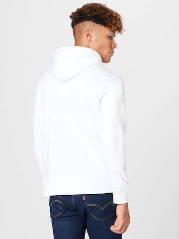 LEVI'S ® Collegepaita 'LSE T3 Graphic Hoodie' värissä valkoinen