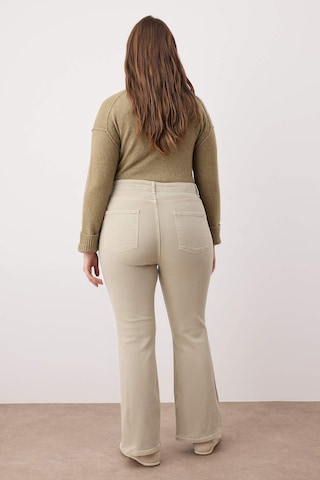 Trendyol Curve Boot cut Jeans in Beige