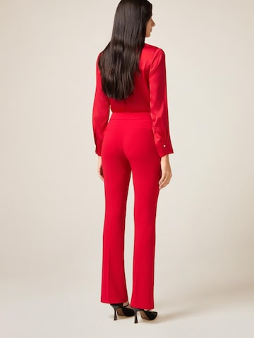 évasé Pantalon oltre en rouge