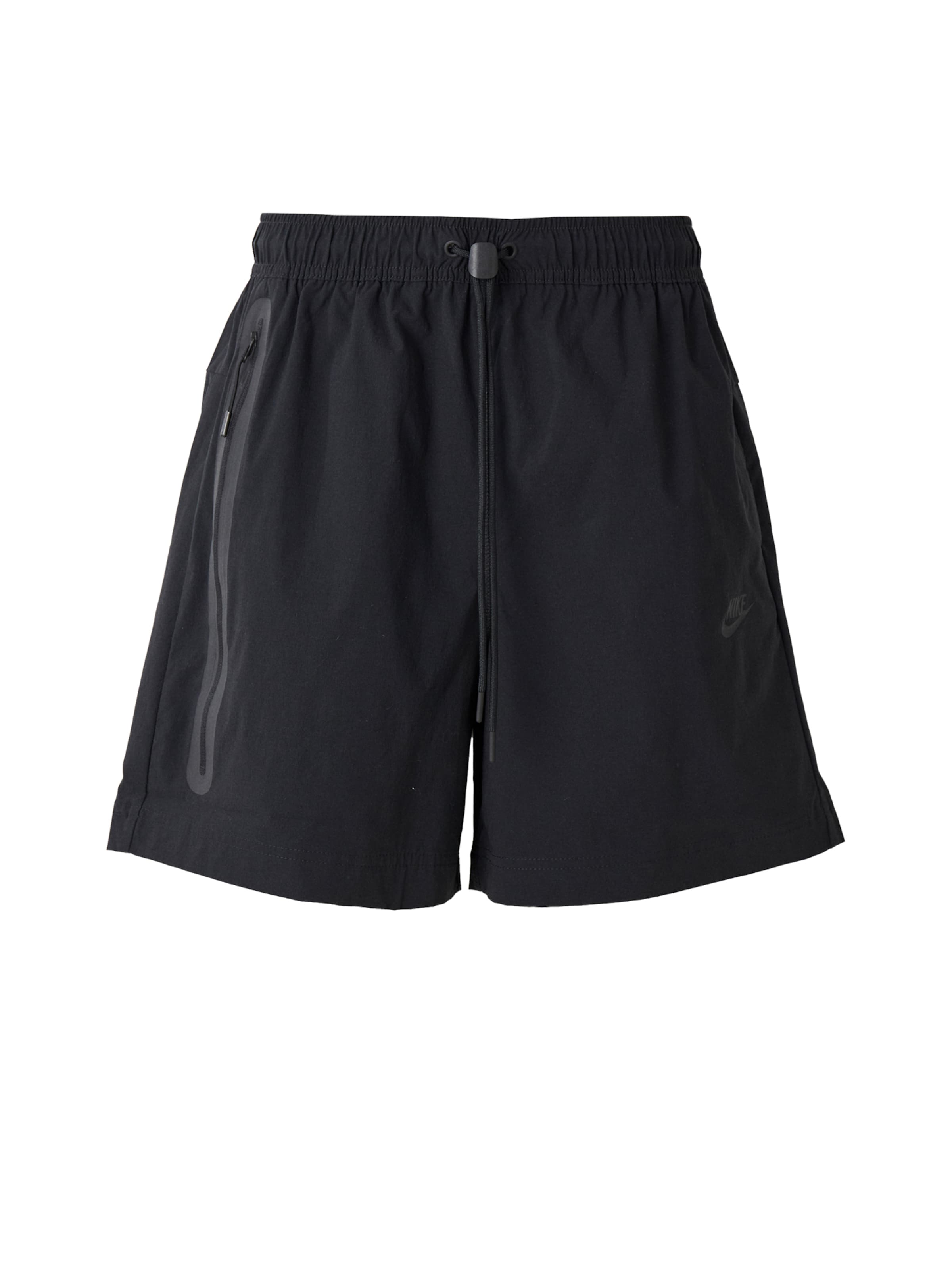 Loosefit Pantalon 'Tech' Nike Sportswear en noir : devant