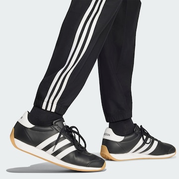 ADIDAS SPORTSWEAR Trainingspak in Zwart