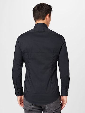 Coupe regular Chemise business 'LUTO' DRYKORN en noir