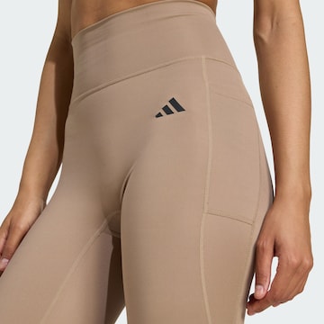 Skinny Pantalon de sport 'Optime Essentials' ADIDAS PERFORMANCE en marron