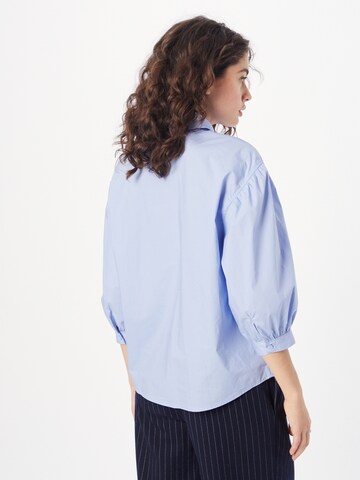 Sisley - Blusa em azul