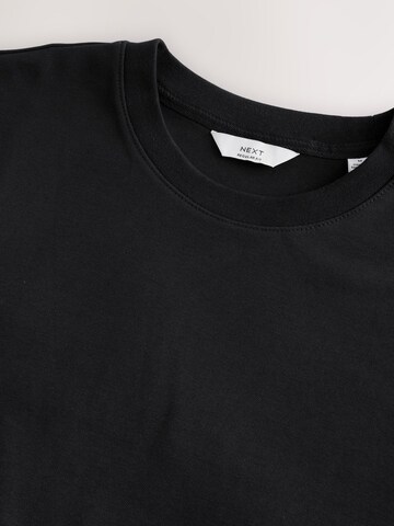 Tricou de la Next pe negru