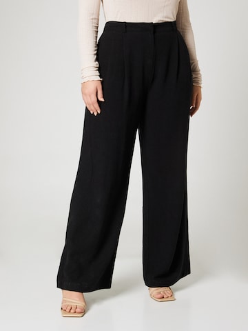A LOT LESS רגל רחבה מכנסים קפלים 'Elisa' בשחור: מלפנים