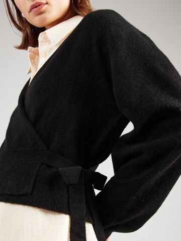 Cardigan ABOUT YOU en noir