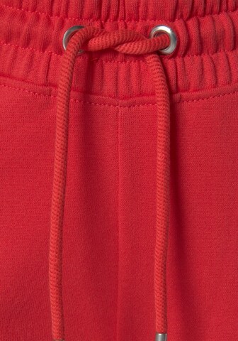 Regular Pantaloni de la H.I.S pe roșu