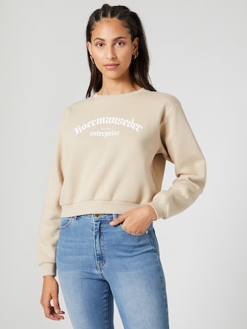 Hoermanseder x About You Sweatshirt 'Ela' in Beige: front