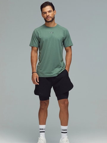 Maglia funzionale 'XFUNCTION Raglan Tee' di DRILLS Apparel in verde