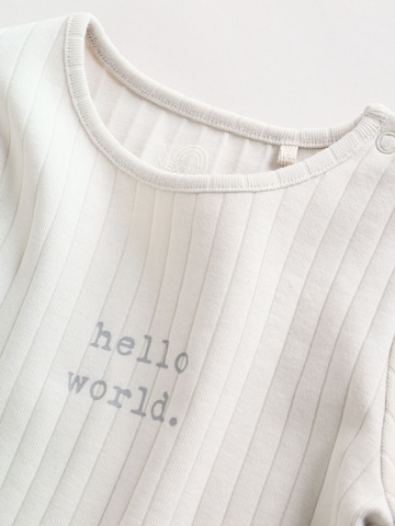 Next Set 'Hello World' i grå