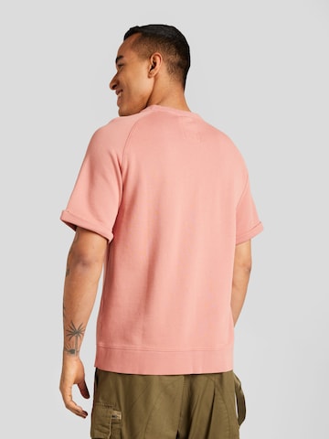 Bluză de molton de la NOWADAYS pe roz