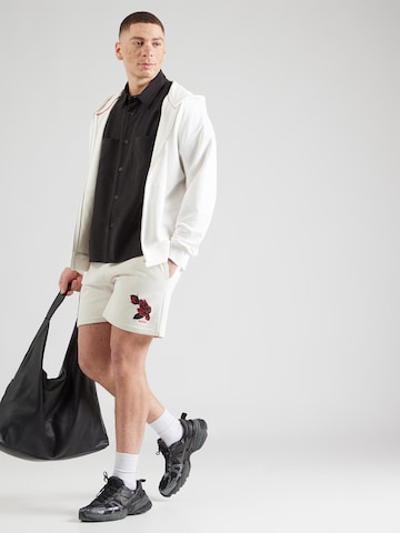 HUGO Lużny krój Spodnie 'Dagety' w kolorze biały