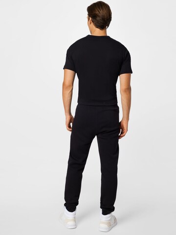 Champion Authentic Athletic Apparel Regular Trousers in Black