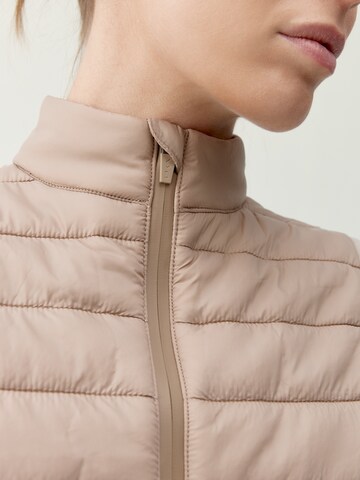 Skinny Gilet de sport ' Vortex ' Born en beige