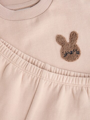 Set Next en marron