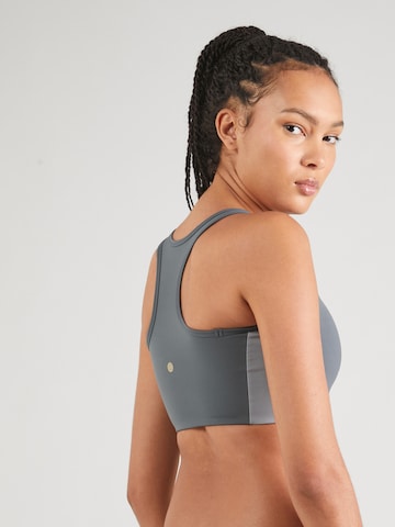 Medium Support Soutien-gorge de sport 'Cathy' Athlecia en gris