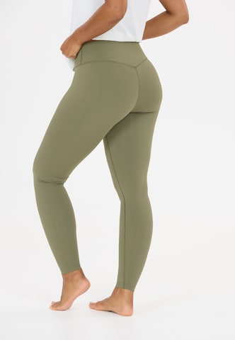 Athlecia Skinny Sports trousers 'Luxe V2' in Green