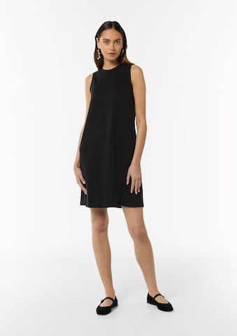 Abito di comma casual identity in nero: frontale