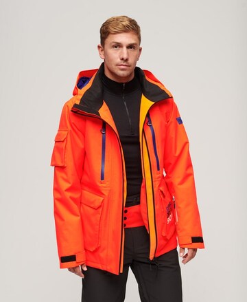 Veste de sport Superdry en orange : devant