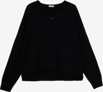 Pullover di oltre in nero: frontale