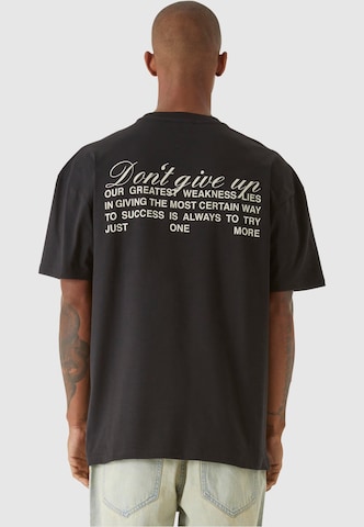 T-Shirt 'Dont't Give Up' 9N1M SENSE en noir : devant