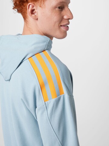 ADIDAS SPORTSWEAR - Sweatshirt de desporto em azul