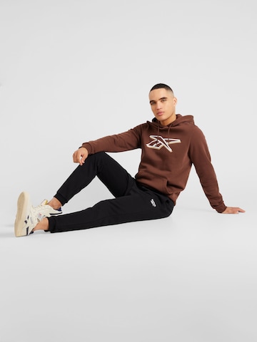 Reebok - Sweatshirt de desporto 'VECTOR PACK' em castanho