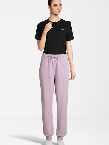 FILA Tapered Urheiluhousut värissä lila