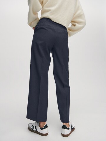 ABOUT YOU x Marie von Behrens Wide leg Trousers 'Philine' in Blue