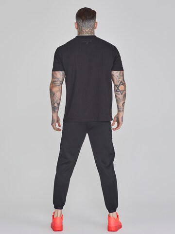 Effilé Pantalon cargo SikSilk en noir