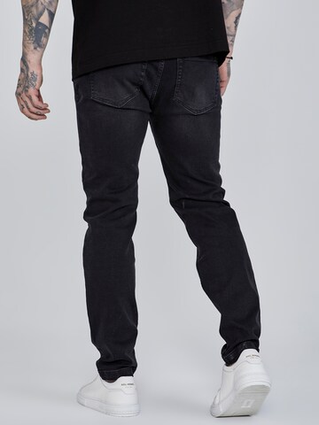 Slimfit Jeans di SikSilk in nero