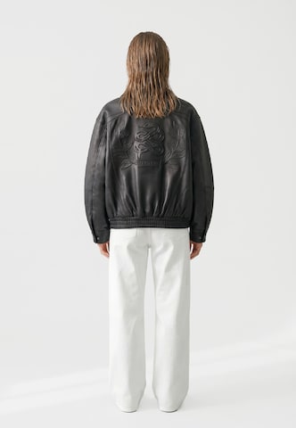 Veste mi-saison Vertere Berlin en noir : derrière