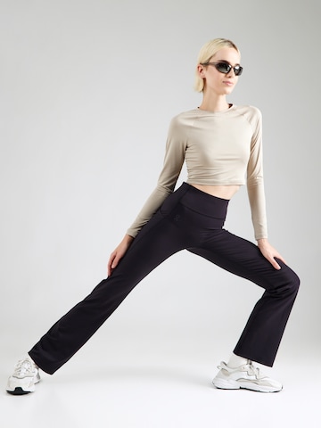 évasé Pantalon de sport On en noir