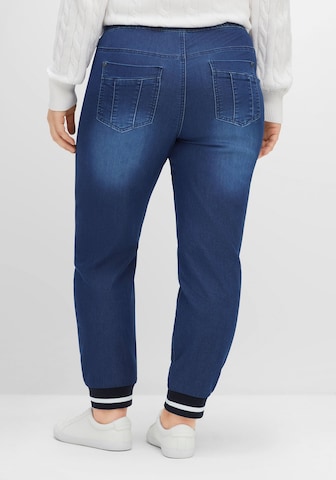 SHEEGO Tapered Jeans in Blau