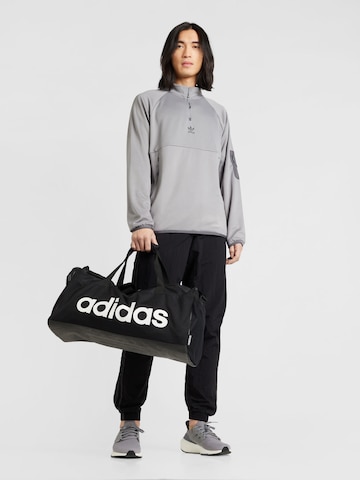 ADIDAS ORIGINALS Ozke Hlače | črna barva