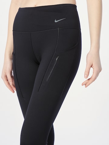 Skinny Pantaloni sport de la NIKE pe negru