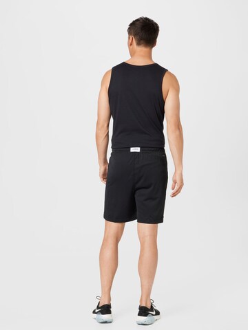 Regular Pantaloni sport de la Jordan pe negru