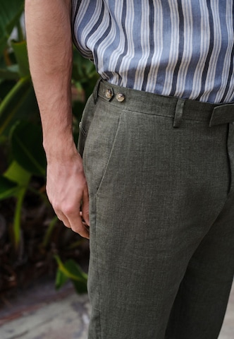 Next Slim fit Trousers 'Signature' in Green