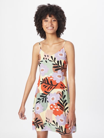 24COLOURS Letní šaty – mix barev: přední strana