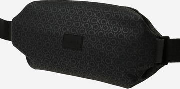 Calvin KleinPojasna torbica - crna boja: prednji dio